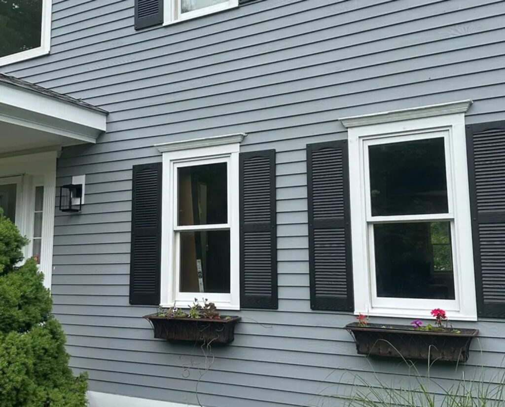 Completed residential exterior in Holden, MA displaying Professional Painting by Lucena Painting, Professional Painting Near Me