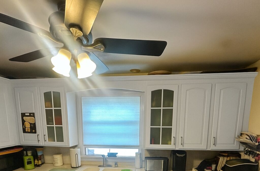 Painter repairing wall imperfections in occupied Acton home office before interior repainting. Interior Painting Near Me.